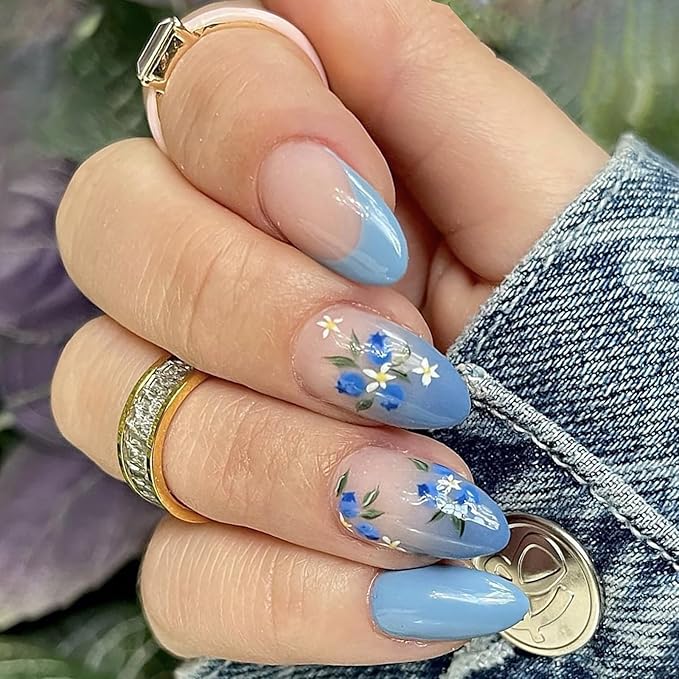 Soft periwinkle nails with delicate hand-painted summer floral accents.

